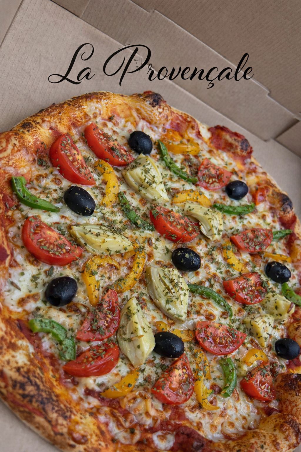 La Provençale - Base tomate, Mozza, Emmental, Poivrons, Tomates, Fonds d'Artichauts, Olives, Origan, Herbes Provençales